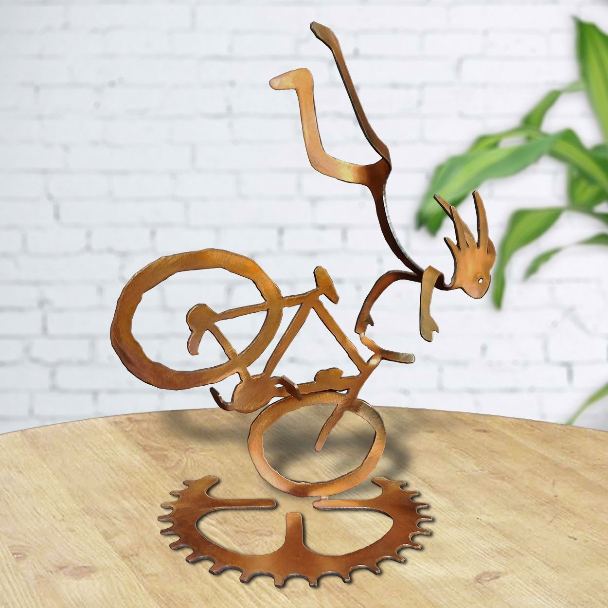 165802 - BS03RT13 14in Mr. Endo Male Kokopelli Cyclist Tabletop Sculpture