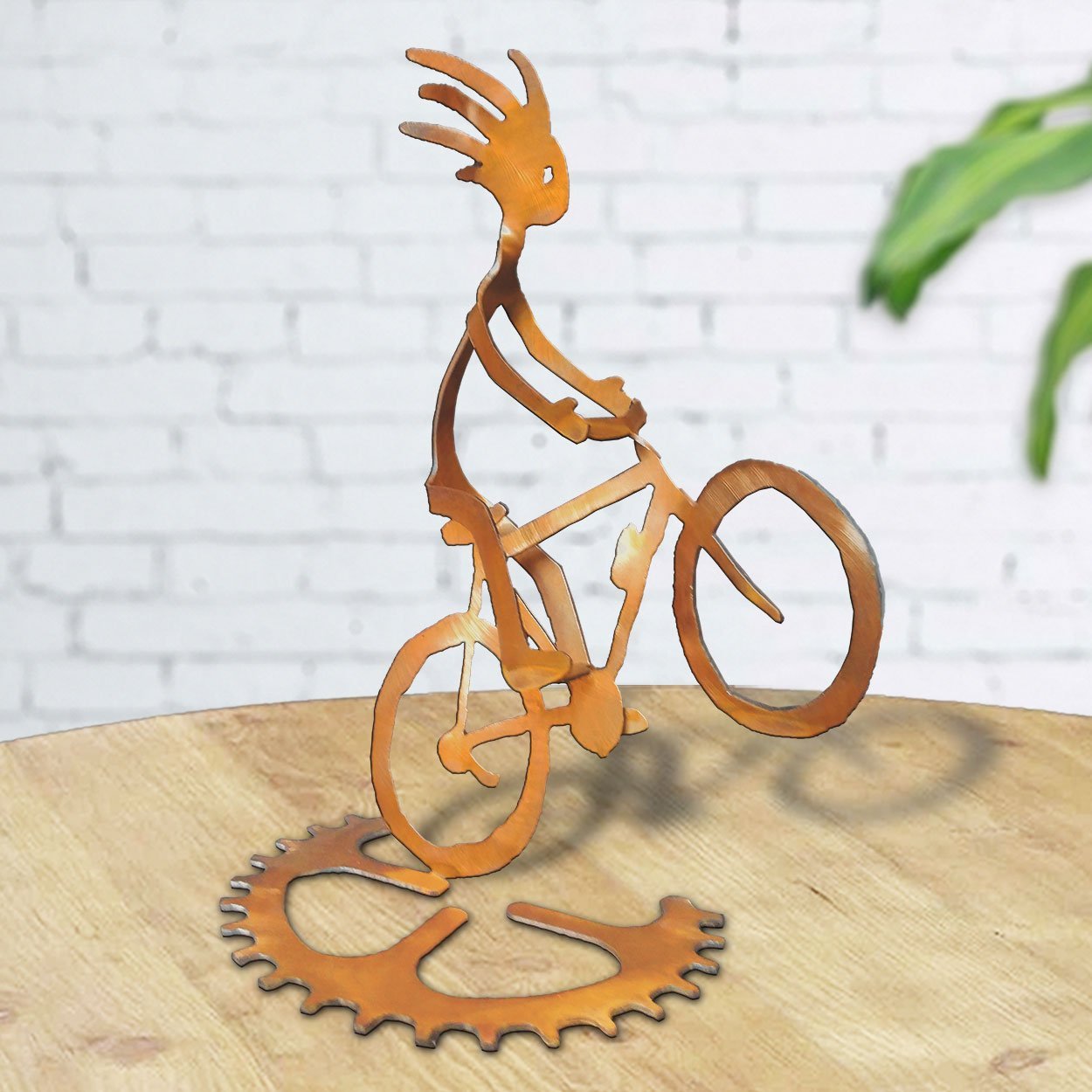 165805 - BS01RT09 10in Mr. Wheelie Male Kokopelli Cyclist Tabletop Sculpture