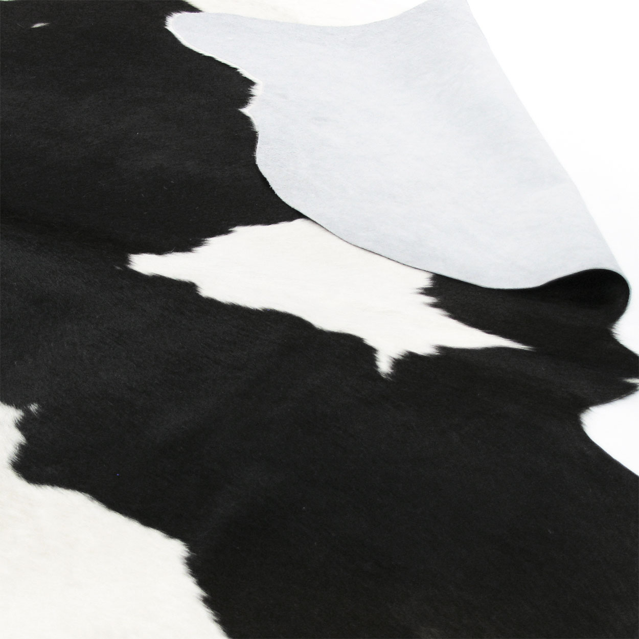 322102 - Value Line Grade B Natural Black and White Cowhide