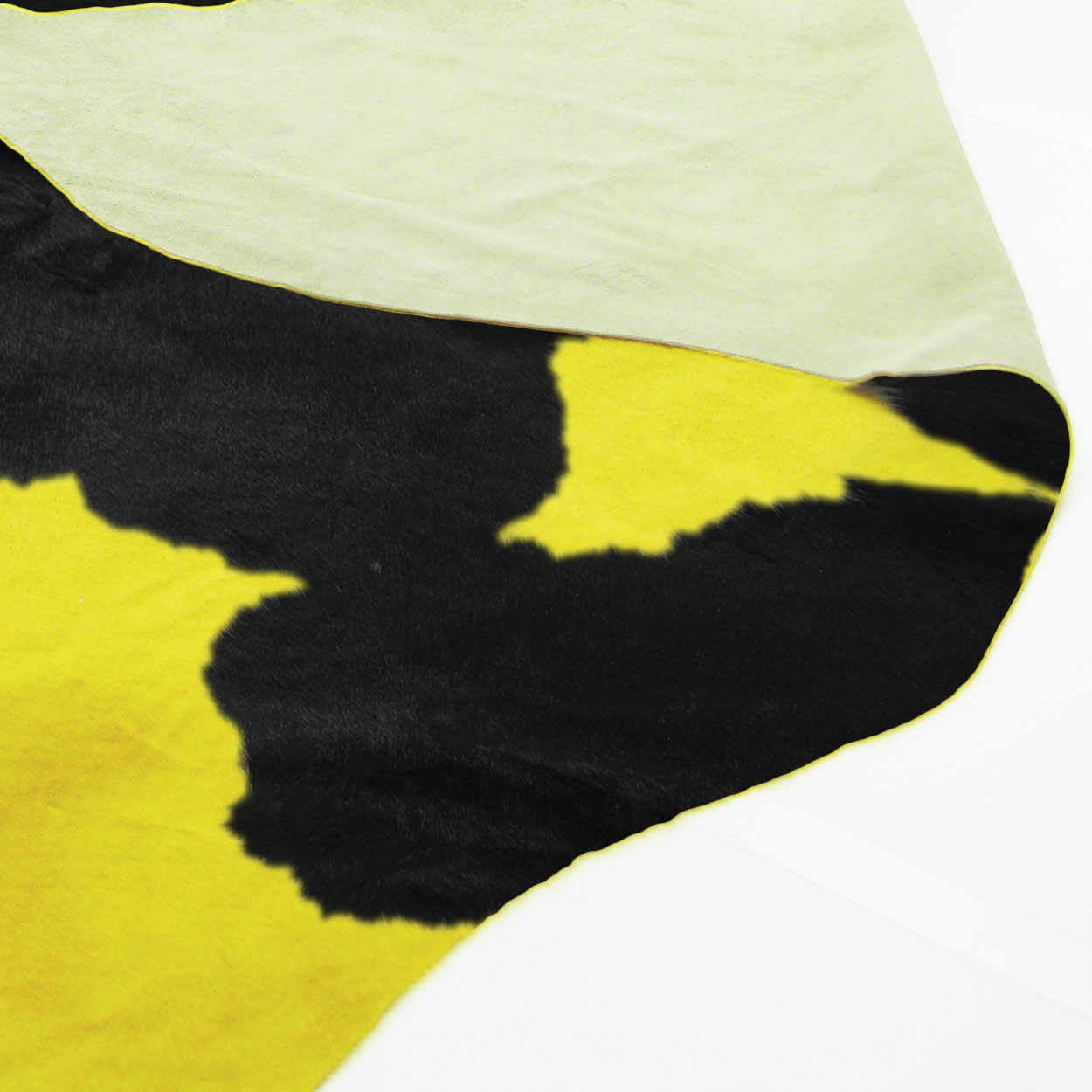 322526 - Colorfast Dyed Yellow on Black and White Premium Cowhide