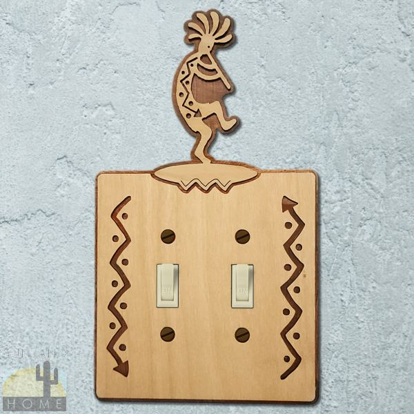 167612S - Flute Kokopelli Wood and Metal Double Standard Switch Plate in Natural Birch Finish