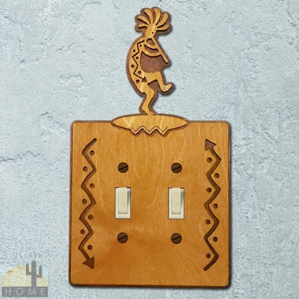 167622S - Flute Kokopelli Wood and Metal Double Standard Switch Plate in Golden Sienna Finish